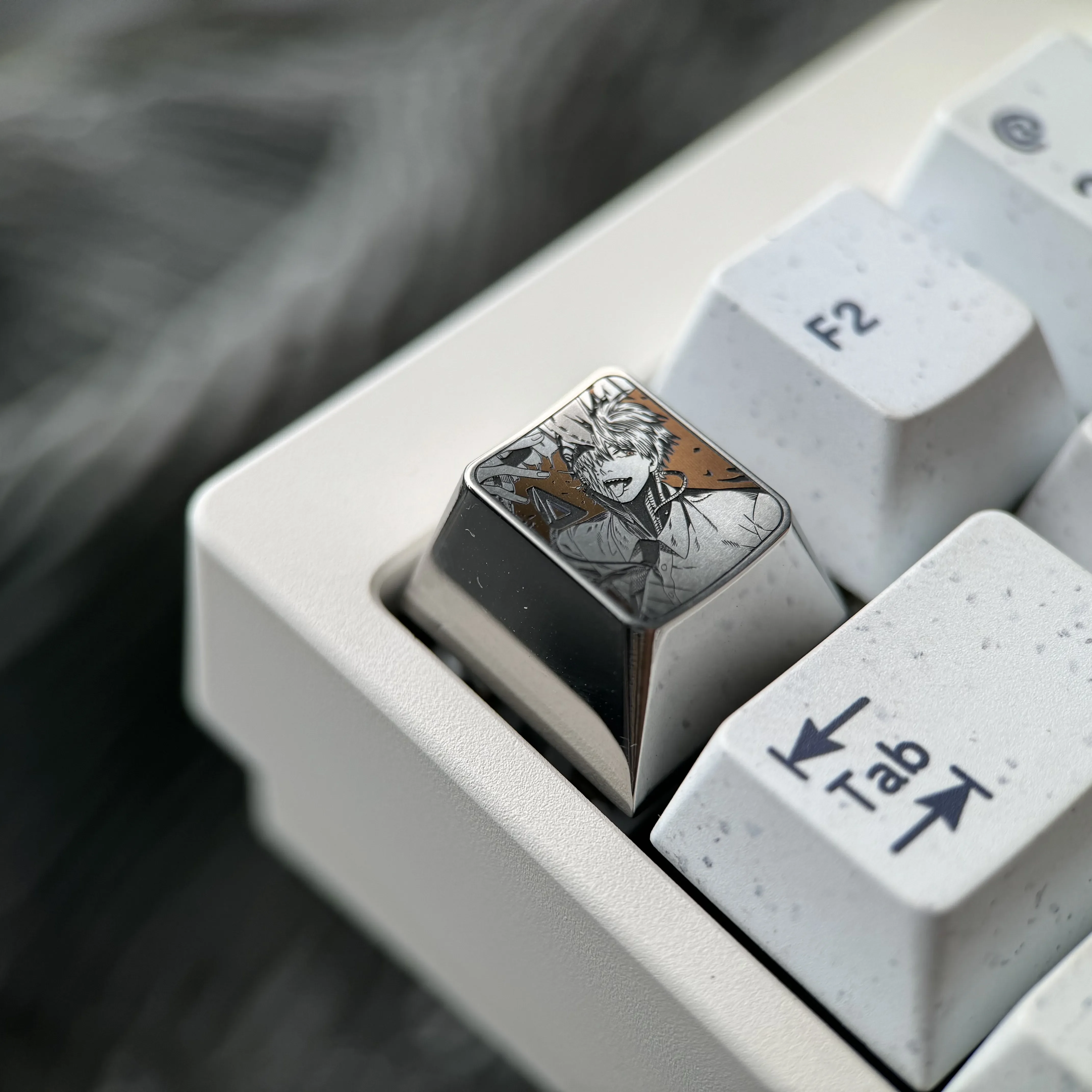 Chainsaw Man Denji titanium keycap gallery showcasing precision-engraved anime art from various angles, highlighting its artistic craftsmanship.