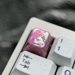 Artistic Chainsaw Man Power titanium keycap, a vibrant premium anime keyboard accessory meticulously crafted with rich colors for fans.