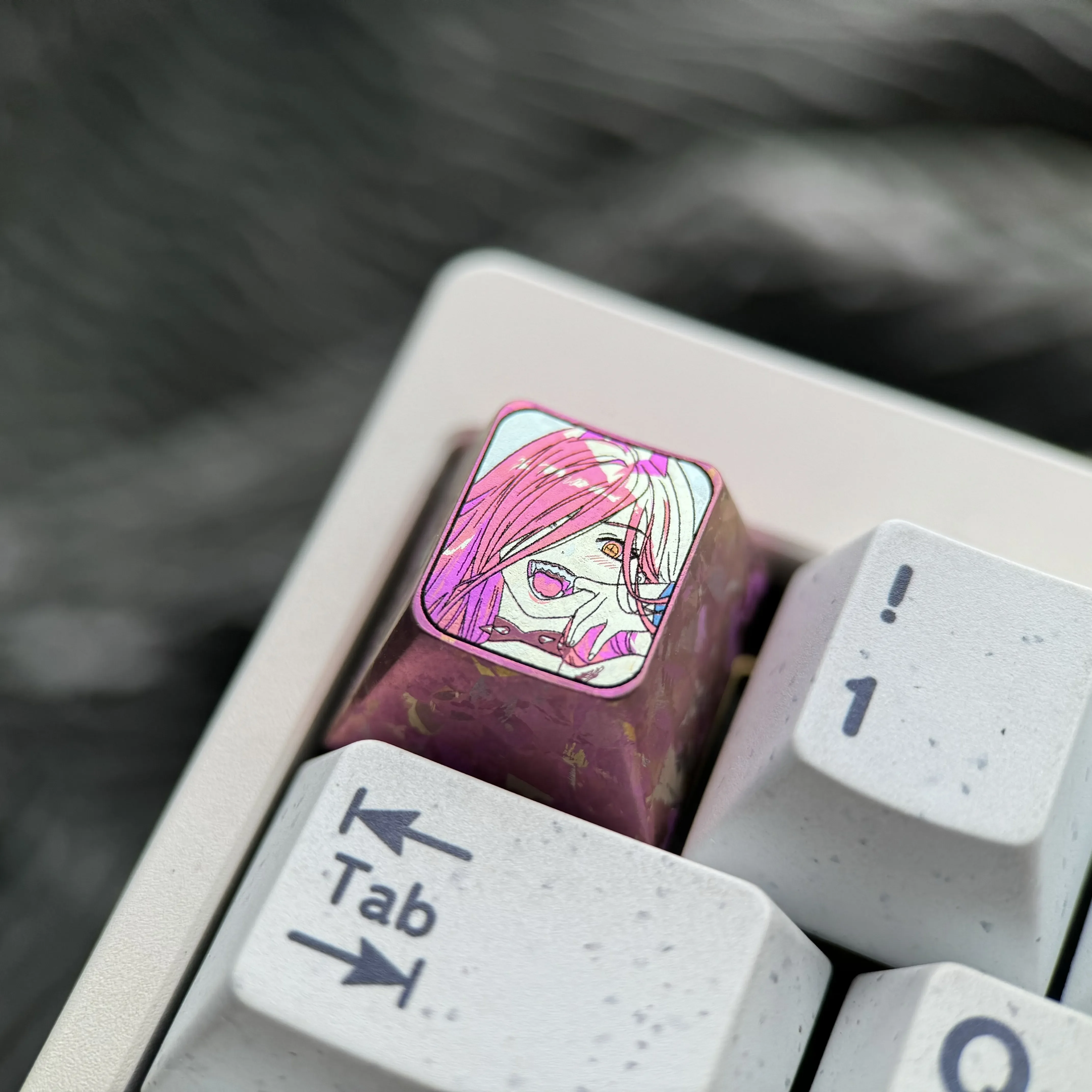 Artistic Chainsaw Man Power titanium keycap, a vibrant premium anime keyboard accessory meticulously crafted with rich colors for fans.