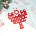 Artistic Mint Crystal Jelly Chrome Hearts Keycap Set, featuring delicate side-engraved gothic heart and cross designs. Translucent PC+ABS for elegant design.