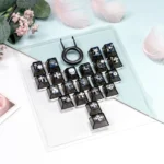 Experience the artistic flair of the Mint Crystal Jelly Chrome Hearts Keycap Set, revealing its translucent PC+ABS elegance and signature side-engraved.