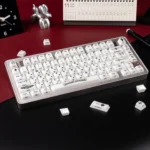 Artistic gallery showcasing the Mint Crystal Jelly Chrome Hearts Keycaps Set side-engraved gothic style and translucent mint elegance.