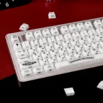 Artistic gallery images of the Mint Crystal Jelly Chrome Hearts Keycap Set, highlighting its side-engraved gothic heart and cross, and elegant design.