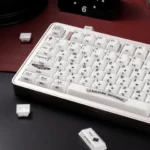 A collection of mint crystal jelly Chrome Hearts keycaps Set, showcasing side-engraved gothic heart and cross designs and translucent elegance.