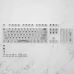 Gothic Luxury Chrome Hearts keycaps set showcasing its frosted translucent PC design for an iconic, edgy keyboard aesthetic.