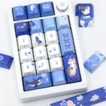 Close-up product images of the exclusive Clarence Lovebrush Chronicles Cherry keycaps set, featuring elegant character artistry and sophisticated collections.
