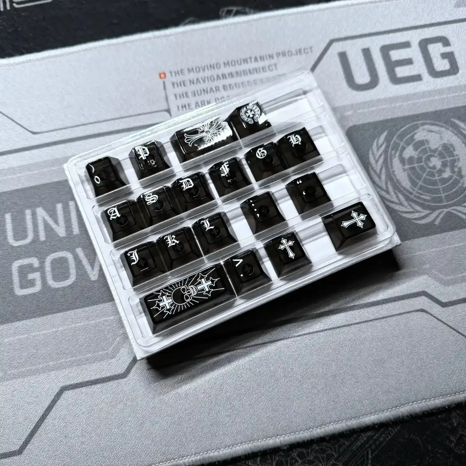 Transparent Cross Sword Supplement Keycap Set, an edgy gothic fantasy piece for mechanical keyboards. Luminous and sophisticated design.