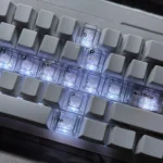 Gallery displaying the Cross Sword Supplement Keycap Set, showcasing its luminous transparent design and edgy gothic fantasy aesthetic.
