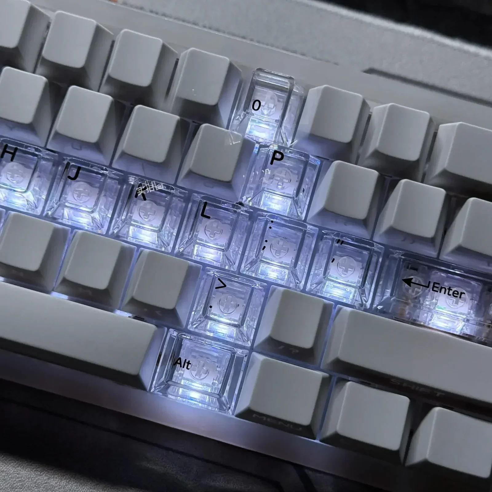 Gallery displaying the Cross Sword Supplement Keycap Set, showcasing its luminous transparent design and edgy gothic fantasy aesthetic.