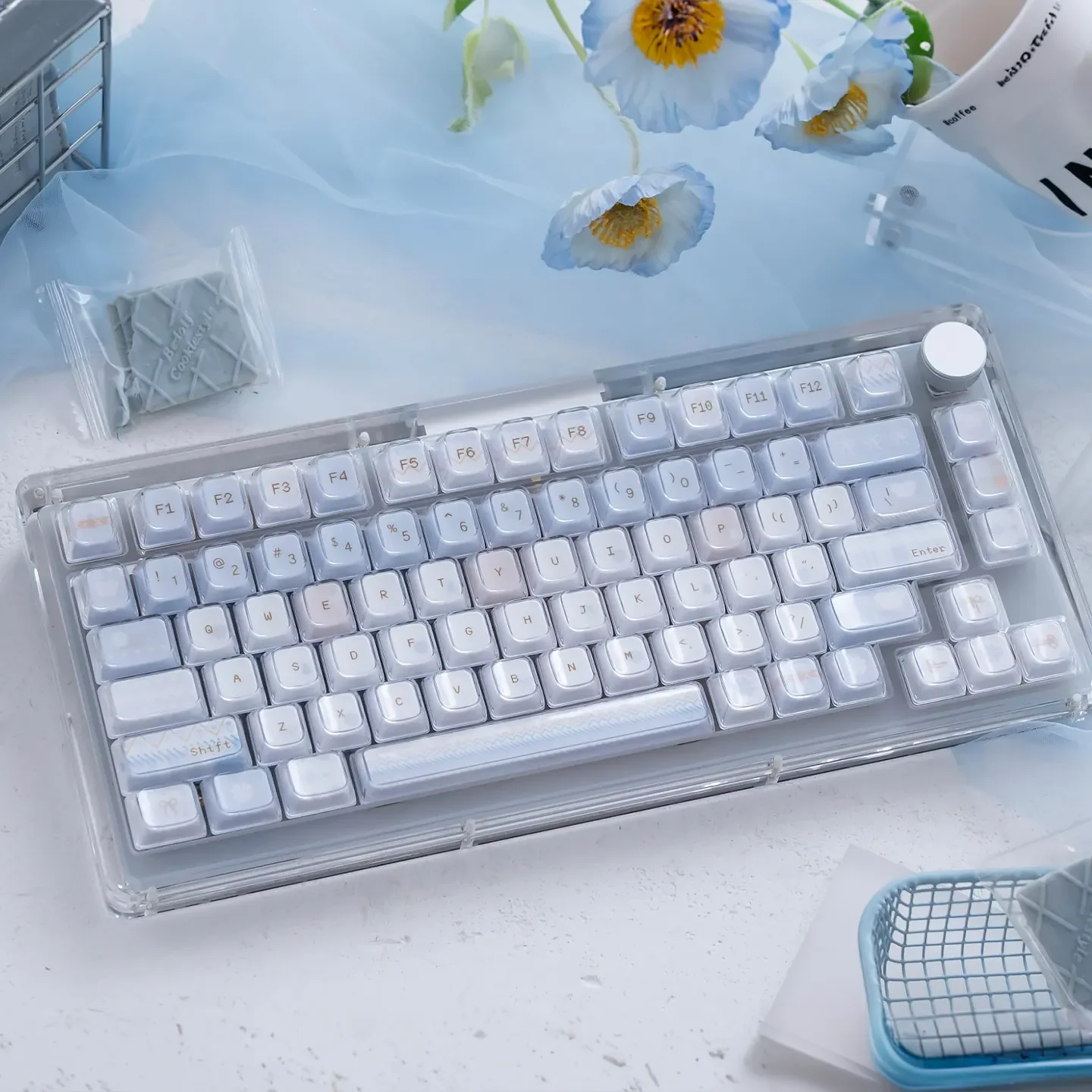A collection of Winter Letter Crystal Jelly Keycaps Set, displaying their luminous translucent PBT+PC design and ethereal KDA profile from various angles.