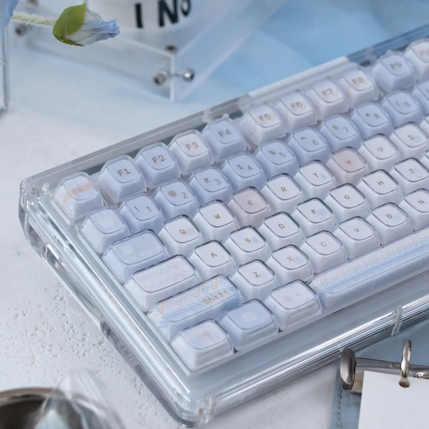 A collection of Winter Letter Crystal Jelly Keycaps Set, revealing their luminous, translucent design and ethereal winter aesthetic from various angles.