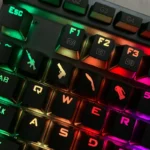 Iconic CSGO Weapon Keycaps displayed from multiple angles, highlighting translucent designs in vibrant red and black, ready for your next tactical.