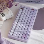 Artistic display of Dreamy Rabbit & Flower Custom PBT Keycaps Set, emphasizing their whimsical side-lit gradient and unique Cherry profile.