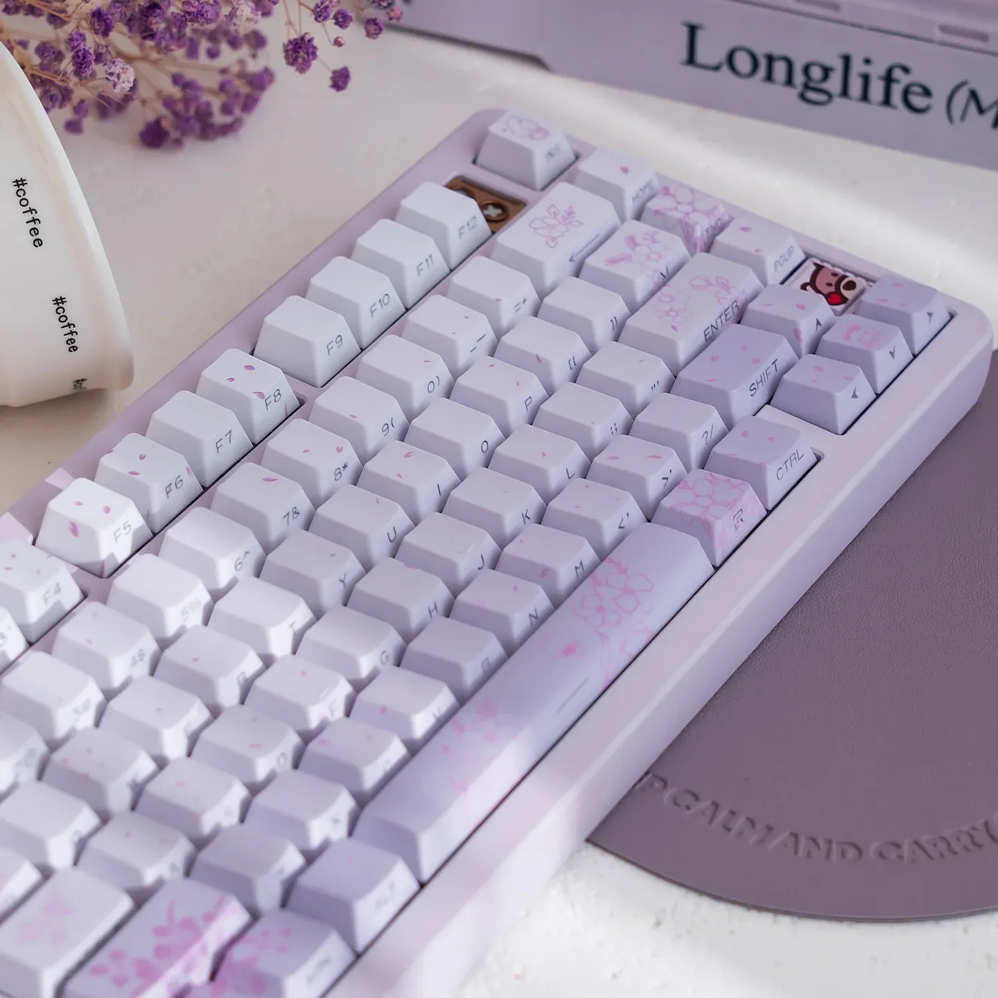 Gallery of custom PBT keycaps set with dreamy rabbit and flower gradients, highlighting side-lit Cherry profile and whimsical dye-sub artistry.