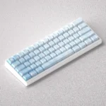 A gallery of Serene Dawn PBT Keycaps Set, highlighting their soft sunrise gradients and durable front-printed legends for mechanical keyboards.