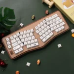Adorable PBT dye-sublimated dessert keycaps, a sweet wonderland featuring various pastel cakes, donuts, and candies from different angles.