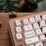 Adorable PBT dye-sublimated dessert keycaps set showcasing a sweet wonderland of pastel cakes, donuts, and candies from various angles.