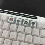 Detailed views of the 4-piece Detective Conan double-layer backlit keycap, featuring vibrant character designs and the stunning translucent legendary setup.