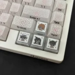 Detailed product shots of the premium Detective Conan double-layer backlit keycaps, showing vibrant anime art and translucent legends from various angles.