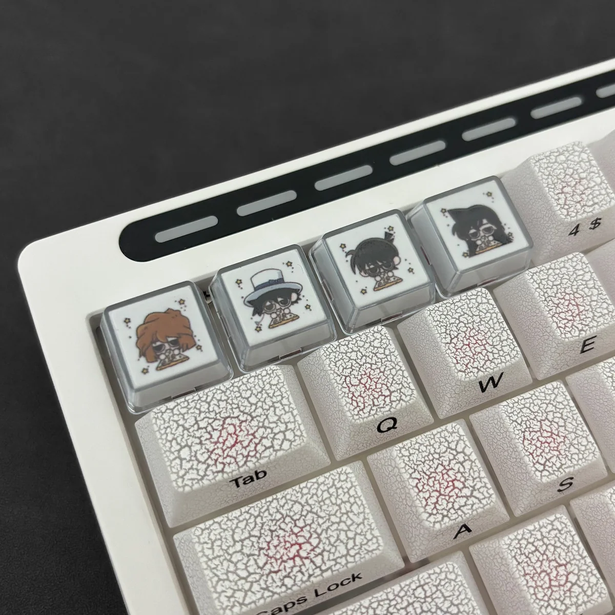 Vibrant Detective Conan backlit keycaps, a premium 4-piece set featuring intricate double-layer designs and glowing anime characters.