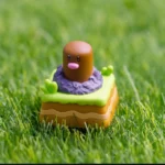 Close-up shots of the handcrafted resin Diglett & Psyduck Keycaps from various angles, revealing its whimsical Pokemon character and unique rotating artisan design.