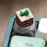 Multiple angles of a whimsical Don't Starve artisan ESC keycap, showcasing intricate handcrafted resin details and gothic game art.