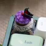 Whimsical Don't Starve Butterfly Muffin artisan ESC keycap, uniquely handcrafted with intricate resin details, capturing the game's quirky charm.