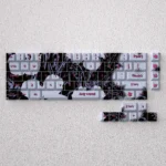 Elegant PBT floral keycaps set beautifully displayed, showcasing subtle patterns and serene aesthetics for a sophisticated compact keyboard upgrade.