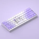 This image captures the premium Emilia Keycaps Set from a dynamic angle, showcasing the full 130-key Cherry profile with stunning side-printed backlit design.