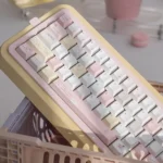 Vibrant Energy Boost PBT keycaps set showcased from various angles, featuring cheerful dye-sublimated designs and a refreshing Cherry profile.