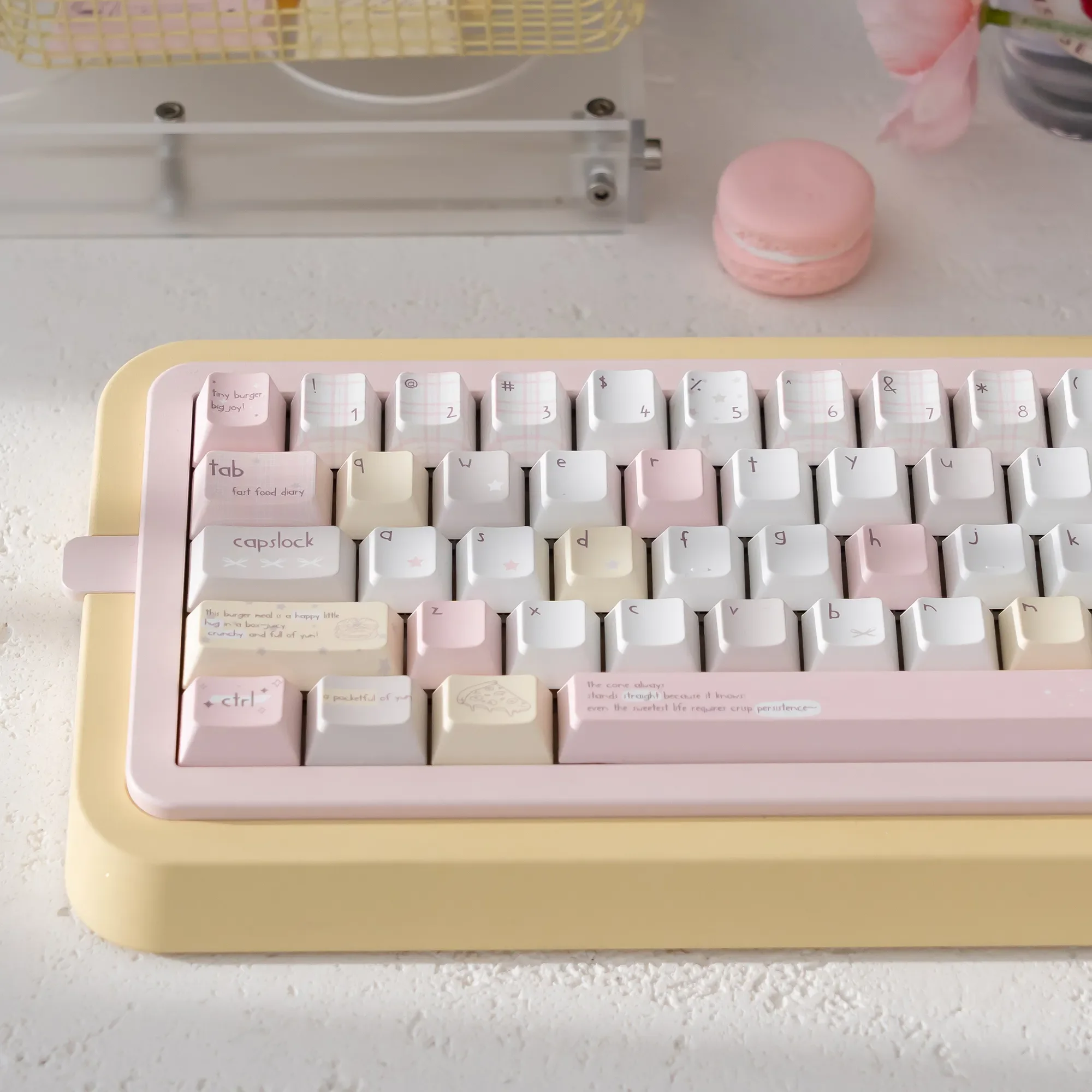 Cheerful Energy Boost PBT keycaps set, dye-sublimated with vibrant, energy-boosting cartoon designs, displayed from various angles.