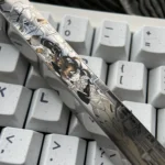 Evangelion Titanium Keycap, Asuka Precision-engraved colored titanium with artistic sci-fi design. Explore intricate details and angles.