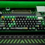 Dynamic gallery view of the exclusive F1 C44 Zhou Guanyu Team Keycap Set, showcasing its premium black and green racing livery from multiple angles.