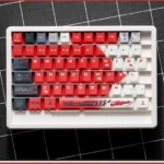 F1 Keycaps set showcasing the exclusive Alfa Romeo C42 Zhou Guanyu theme with dynamic motorsport aesthetics, celebrating true F1 passion.