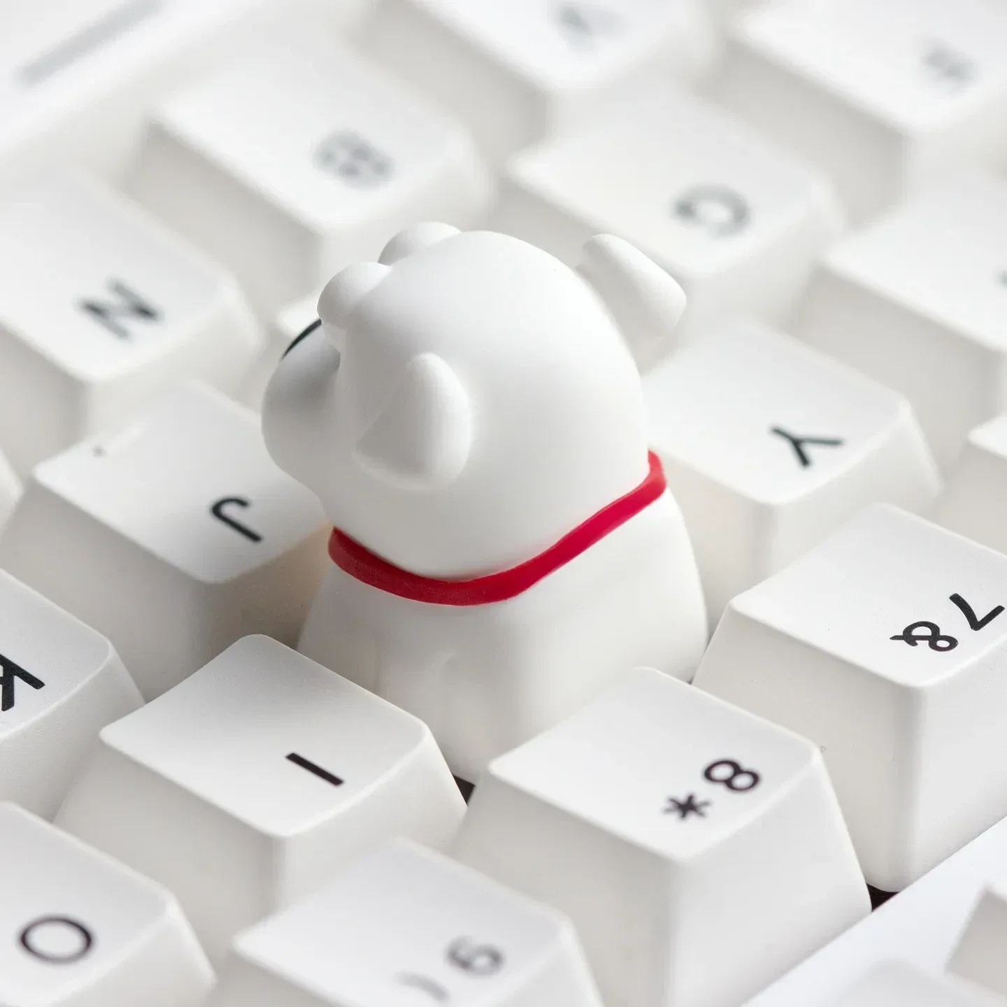 Close-up gallery of the handcrafted Brian Griffin resin keycap, showcasing its vibrant details and meticulous sculpting from all angles.