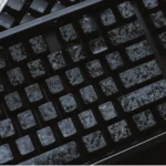 Authentic forged carbon keycap set with dynamic matte translucent finish, showcasing understated luxury and subtle diffused backlighting.