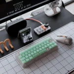 Ethereal frosted emerald PC keycaps set displayed from multiple angles, highlighting their refreshing, translucent glow and premium quality.