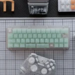 Ethereal frosted emerald PC keycaps set showcasing its refreshing translucent glow and modern aesthetic, perfect for custom keyboards.