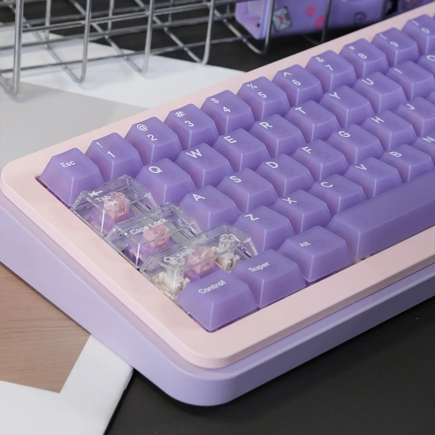 Ethereal light purple frosted PC keycaps set presented from multiple angles, revealing their candy-like translucence and soft pastel mist aesthetic.