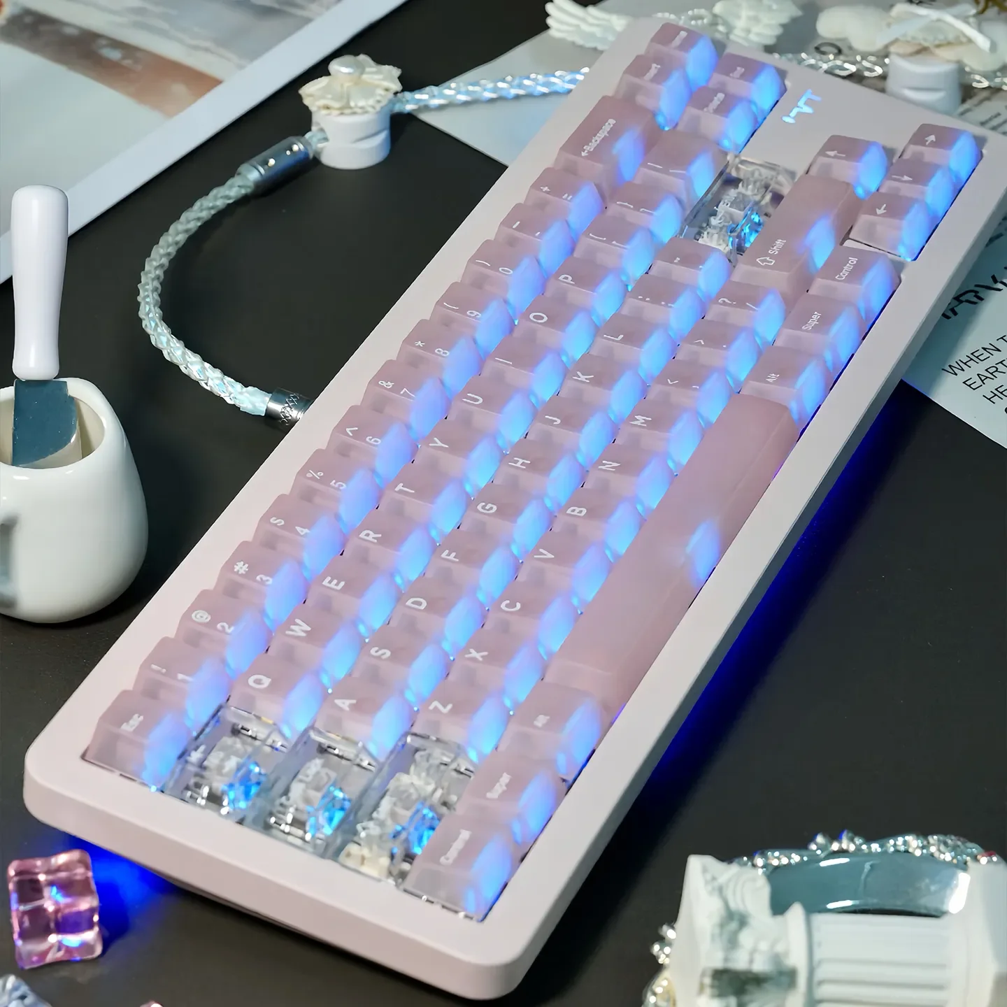 Frosted pink keycaps set showcased from different angles. These translucent PC keycaps set embody an ethereal, dreamy aesthetic with their soft pastel design.