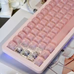 Product image set of ethereal frosted pink translucent PC keycaps set, displaying various angles of their soft, dreamy, modern design.