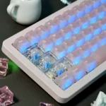 Multiple angles of ethereal frosted pink translucent PC keycaps set showcasing their dreamy, soft aesthetic and diffused light effect.
