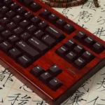 Sophisticated Frosted Wine Red Keycaps Set gallery, showcasing various angles and the ethereal frosted PC transparency of the rich wine hues.