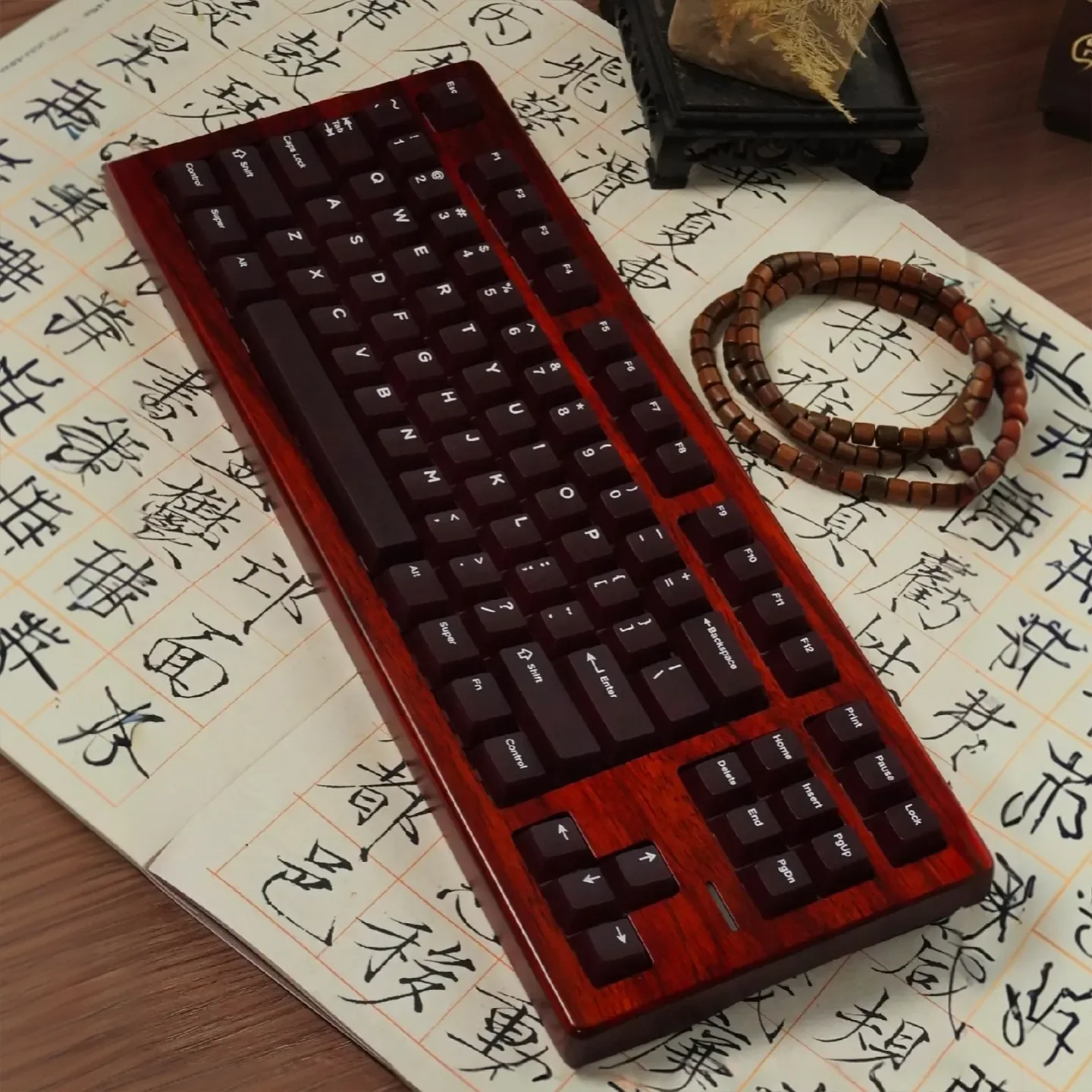 Elegant frosted wine red PC keycaps set for magnetic switches, showcasing their unique translucent glow and premium texture in a full 132-key set.