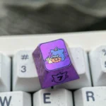 Premium titanium alloy Gengar artisan keycap, showcasing a stylized Gengar with a striking metallic purple finish and artistic design.
