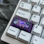 Detailed gallery views of the premium titanium Gengar keycap, highlighting its vibrant, sculpted anime design and custom craftsmanship from multiple angles.