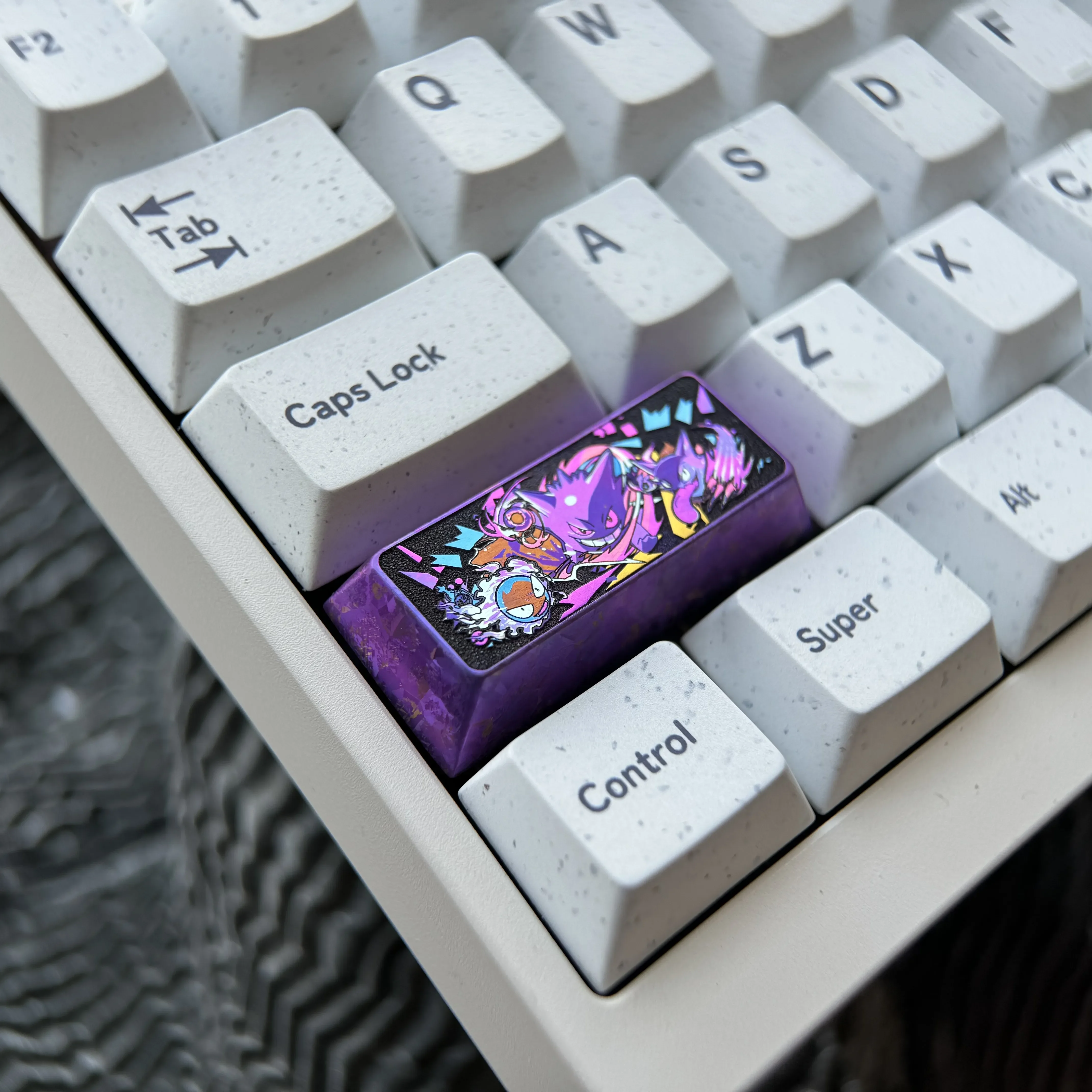 Multiple angles showcase the premium titanium Gengar keycap, highlighting its playful sculpted design and vibrant anime aesthetic for mechanical keyboard.