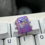 Vibrant Gengar titanium artisan ESC keycap, showcasing intricate anime detail and unique metallic finish. The iconic Gengar keycap for mechanical keyboard.