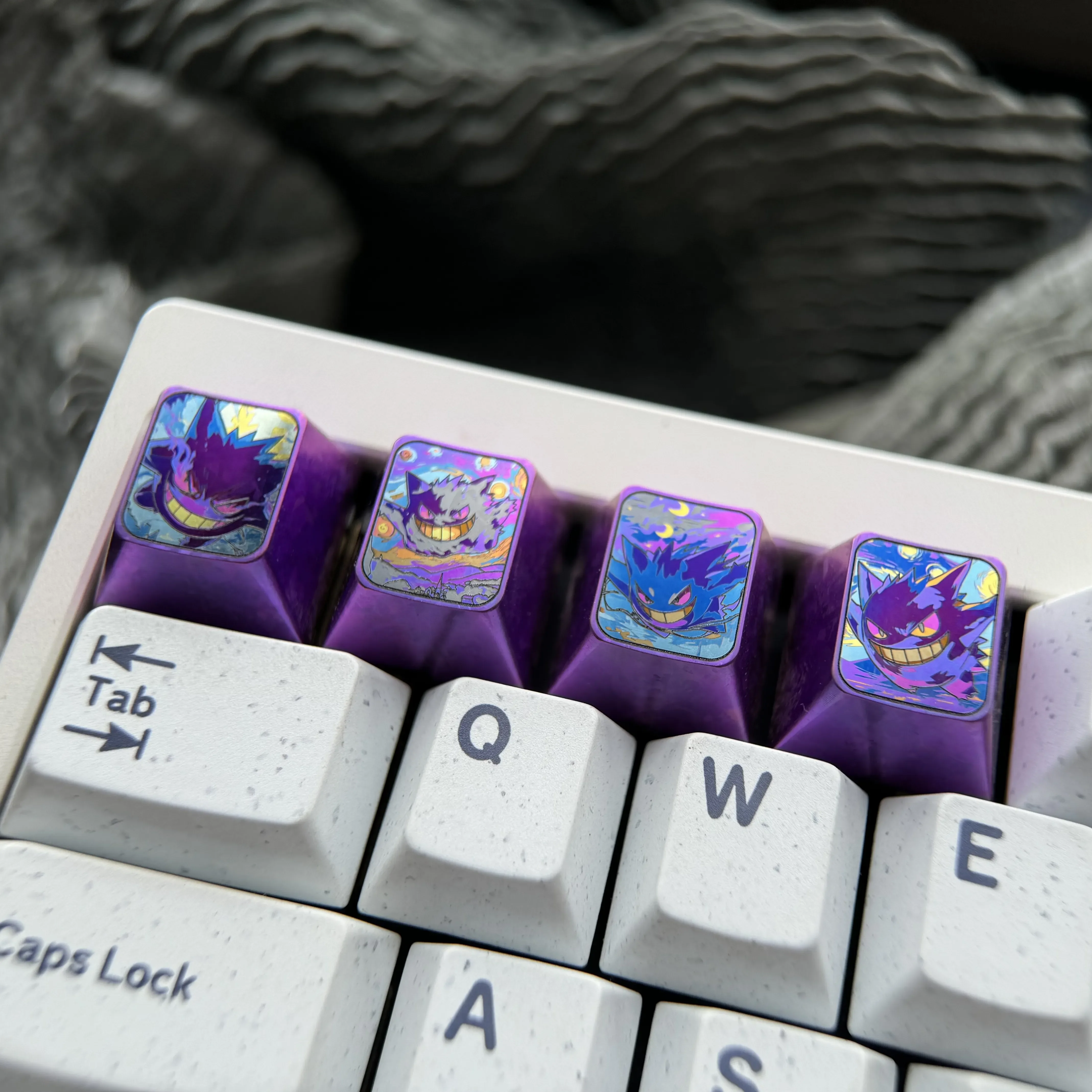 Iconic vibrant Gengar titanium artisan ESC keycap for mechanical keyboards, highlighting its intricate anime design and premium craftsmanship.