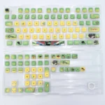 Genshin Impact Kinich creamy translucent keycaps set from multiple angles, showcasing their soft milky pastel hues and ethereal glow.